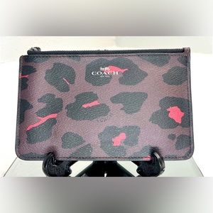 In EUC Coach Oslet zippy pouch